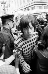 Mick Jagger of The Rolling Stones surrounded by fans on Broadway. 2nd June 1964 Mick Jagger of The Rolling Stones surrounded by fans on Broadway. 2nd June 1964