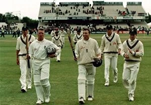 Images Dated 5th July 1998: Mike Atherton and Alec Stewart leave the field July 1998 after putting on over two