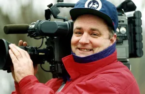Mike Lloyd photographer holding video camera Mike Lloyd photographer holding video camera