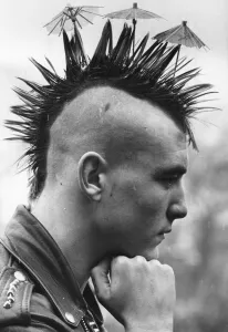 Mike the spike Lang with his Mohican haircut complete with tiny cocktail umbrellas Mike the spike Lang with his Mohican haircut complete with tiny cocktail umbrellas