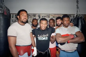 Mike Tyson with sparring partners ahead of his bout with James Bonecrusher Smith Mike Tyson with sparring partners ahead of his bout with James Bonecrusher Smith