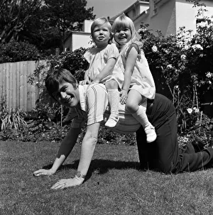 Mike Yarwood with his daughters Charlotte and Claire. 8th July 1974 Mike Yarwood with his daughters Charlotte and Claire. 8th July 1974
