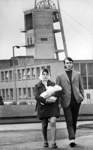 Miner George Purcell and wife Brenda, pcitured with baby daughter Caroline at Bilston Miner George Purcell and wife Brenda, pcitured with baby daughter Caroline at Bilston