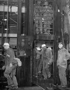 Miners coming off shift at Hamstead Colliery, West Bromwich to the news that the mine is Miners coming off shift at Hamstead Colliery, West Bromwich to the news that the mine is