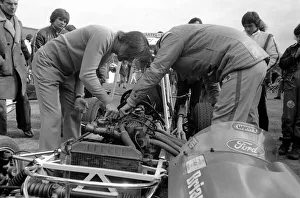 Mini Grand Prix: White City Stadium: Graham Hill sorting out a few performance problems Mini Grand Prix: White City Stadium: Graham Hill sorting out a few performance problems
