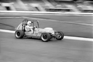 Mini Grand Prix: White City Stadium: Graham Hill. March 1975 75-01610 Mini Grand Prix: White City Stadium: Graham Hill. March 1975 75-01610