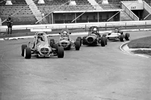 Mini Grand Prix: White City Stadium: Graham Hill. March 1975 Mini Grand Prix: White City Stadium: Graham Hill. March 1975