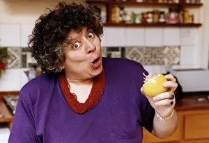 Miriam Margolyes actress eating an orange and pulling a face Miriam Margolyes actress eating an orange and pulling a face