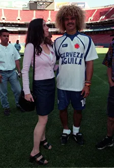 Mirror girl Charlotte Kemp with Colombia Football 1998 team player Carlos Mirror girl Charlotte Kemp with Colombia Football 1998 team player Carlos