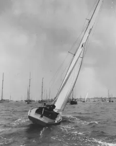 00002 Prints: 1950 Print: Claire Aisher in Dragon Class Boat