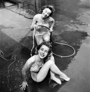 00010 Prints: Print of Two Women Cooling Down with a Hose Pipe
