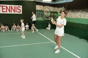 00017 Prints: Wimbledon Print: Monica Seles with Children at Short Tennis
