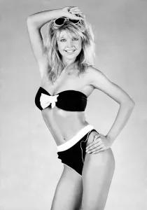 Beachwear Model Prints: Clothing Beach. Sultry charm frilly knicker bikini with bow and a host of roll up