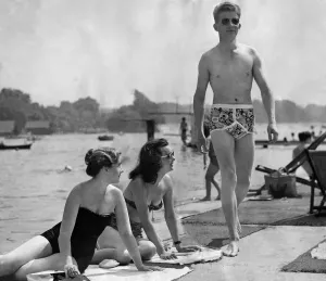 00026 Prints: 1950s Print of Man in Y Fronts Passing Two Girls
