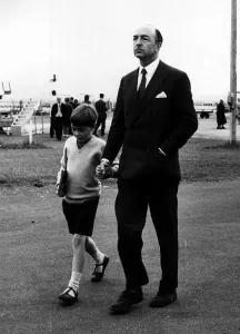 00027 Prints: Print of John Profumo with his son David arriving in Scotland, August 1963