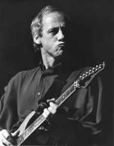 Mark Knopfler leads Dire Straits in a 1989 Newcastle concert print