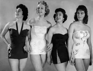 Vintage Beachwear Prints: Four models wearing one piece swimsuits. March 1955 P018066