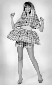 Retro Swimwear Designs Prints: Woman wearing an all-in-one idea-beach hat, sunshade, shorts and a micro-mini