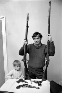 00033 Prints: Brian Entwistle with Son and Firearms Print