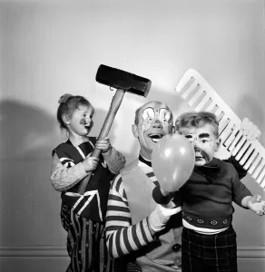 Vintage Fancy Dress Costumes Prints: Four year old girl learning how to be a clown like her daddy. Blackpool clown Ernie