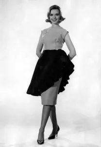 00038 Prints: Print of Model Sarah Browne in a sleeveless top with long skirt, April 1961