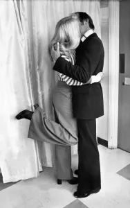 00040 Prints: A Young Couple Enjoy a Kiss and Cuddle Print