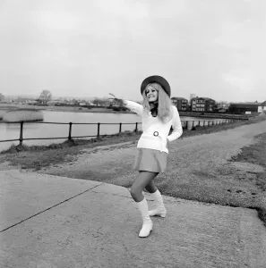 00041 Prints: Young Woman in Hat and Boots Print, December 1969
