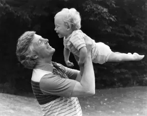 00043 Prints: Television presenter Michael Aspel with son in a 1982 Print