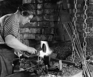 00044 Prints: World War II Women Print: A Mother at the Forge