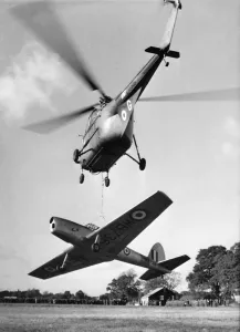 00045 Prints: Print of a Whirlwind helicopter lifting a Chipmunk aircraft