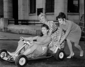 00046 Prints: Three Windmill Girls on the Go Kart Print, July 1960