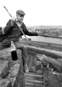 00048 Prints: Steeple Jacks Print: A Chimney Climber at Work