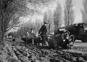 00051 Prints: Miniature Tractor Ploughs Print, February 1948