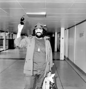 00055 Prints: Demis Roussos at Heathrow Airport Print, February 1981