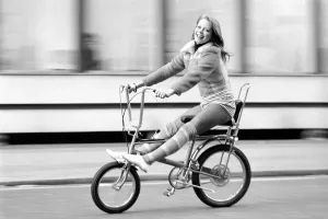 00057 Prints: December 1971 Print: Susan Sayer on a Vintage Chopper Bike