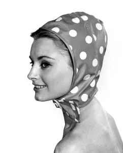 60s Fashion Trends Prints: Reveille Fashions 1964: Margaret Lorraine modeling a polka dot scarf. July 1964 P007617