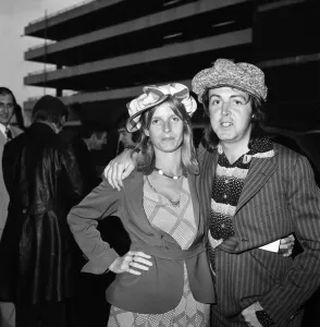 00058 Prints: Paul McCartney with Linda at Heathrow Airport Print, April 1975