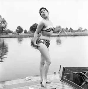 Retro Swimwear Designs Prints: Dancer Angie Curtis seen here modelling the latest beachwear