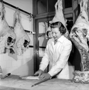 00067 Prints: 1954 Print of a Woman Butcher at Work