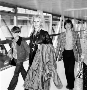 00068 Prints: Rex Harrison Family at Heathrow Airport Print, April 1975