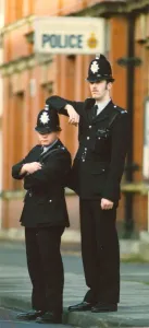 Little and Large Print: Unconventional Police Pair (00073)