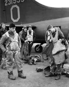 00073 Prints: Print of a US B-17 Waist Gunner Preparing for Combat in England, 1944