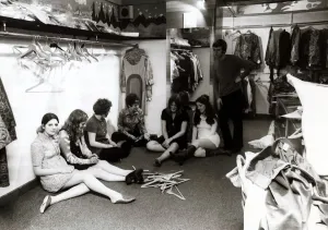 00084 Prints: Women Resting After a Hard Day in Shop Print - 1968