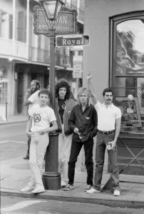 Prints of Queen Left to Right John Deacon, Brian May, Roger Taylor and Freddie Mercury seen here relaxing on the streets of New Orleans, USA 0000to0099 Prints: Queen Print - New Orleans Rehearsal, 21st September 1981