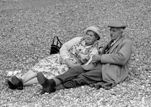 00087 Prints: Elderly Couple Sunbathing Print, Brighton 1958