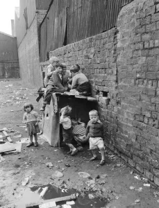 Prints of Children playing in the back alleys of a Goven tenement block. September 1956 0000to0099 Prints: Children at Play, Goven Tenement Block Print 1956