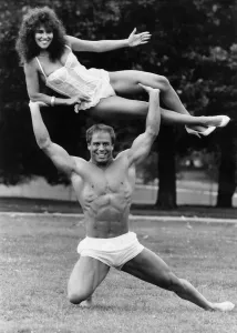 Linda Lusardi Lifted by Strongman Julien Moss Print