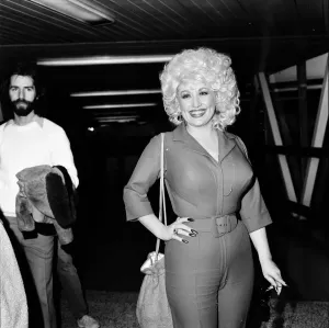 Dolly Parton Arrives at London Airport Print 22nd March 1983