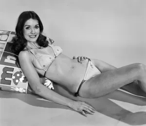 Vintage Swimwear Models Prints: Miss UK and World 1974, Helen Morgan poses in the studio. 24th November 1974