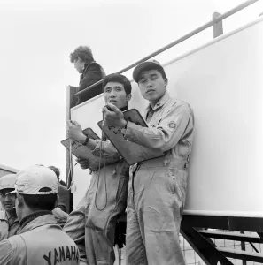 Prints of TT Races 250cc Lightweight International. Yamaha team mechanics in the pits. 14th June 1965 Isle Of Man Prints: Yamaha Team Mechanics in the Pits, 1965 TT Races Print